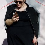 Baseball Jacket and Black Dress